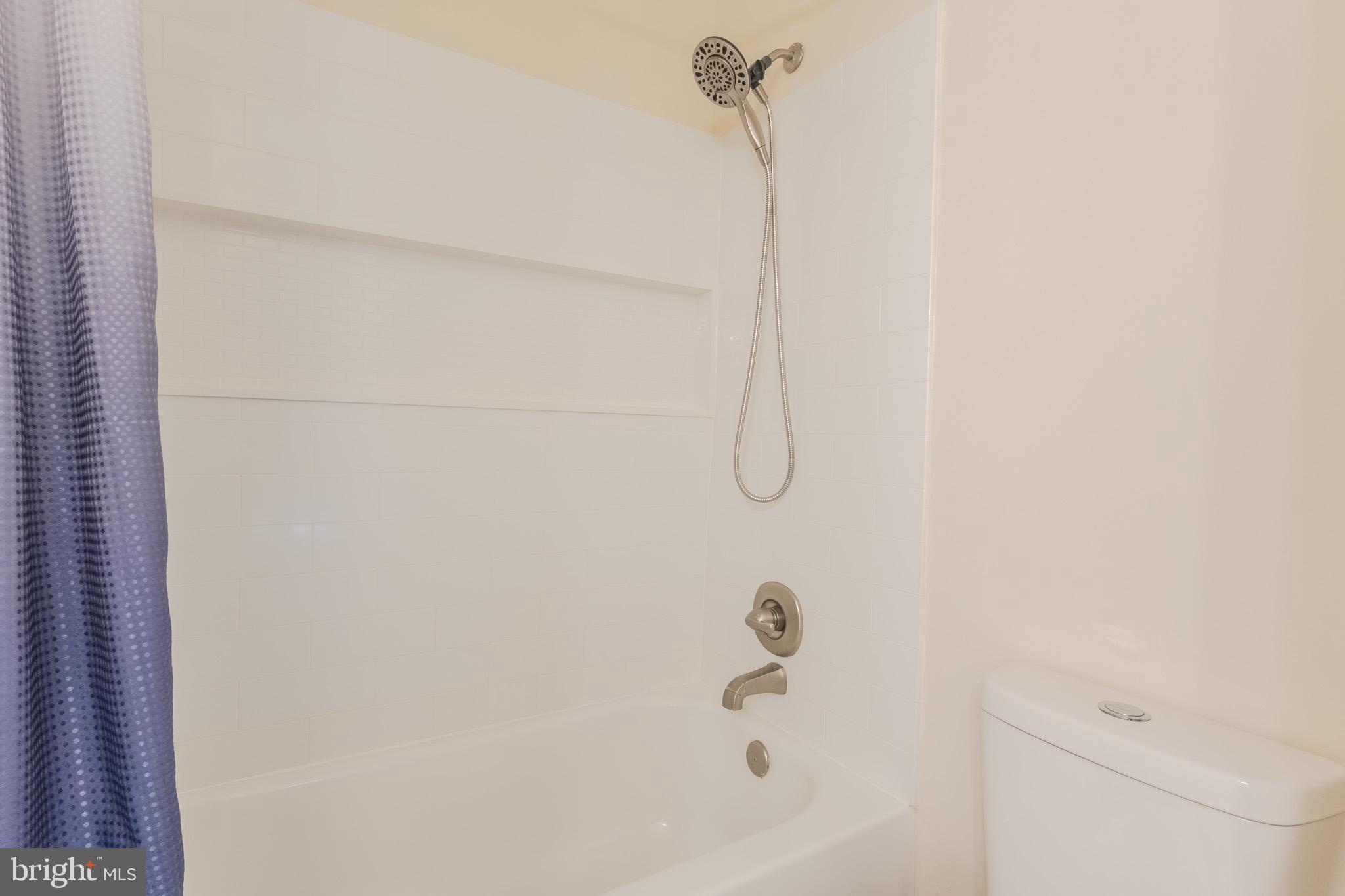 2437 High Brandy Way Odenton, MD 21113 - Photo 23 of 47 a bathroom with a bathtub