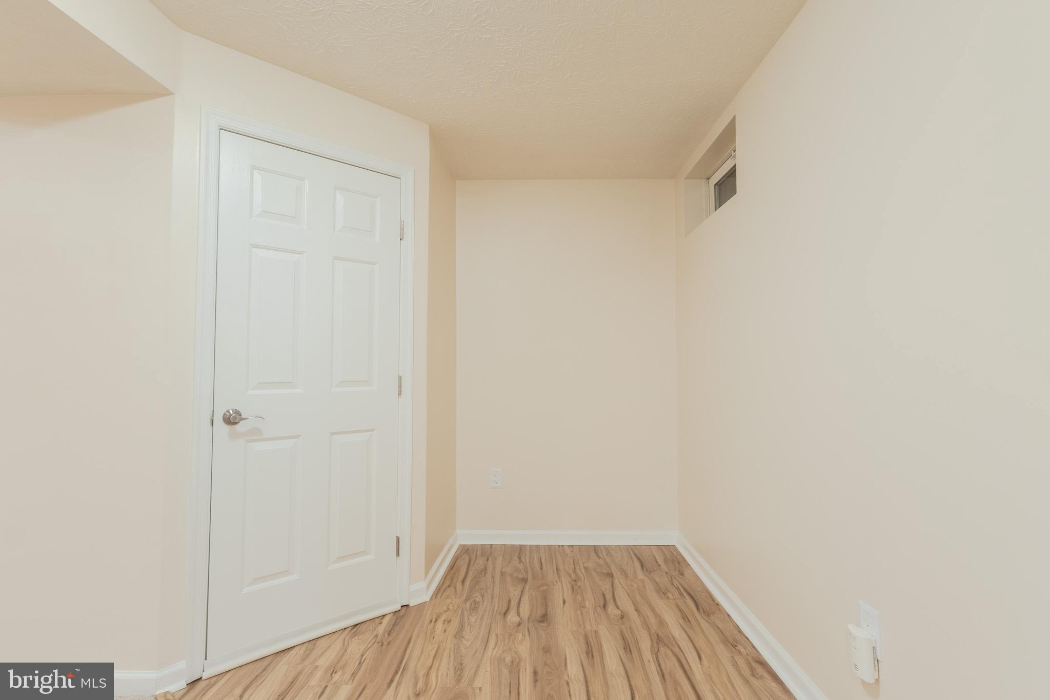 2437 High Brandy Way Odenton, MD 21113 - Photo 37 of 47 a view of a small space with wooden floor and a window