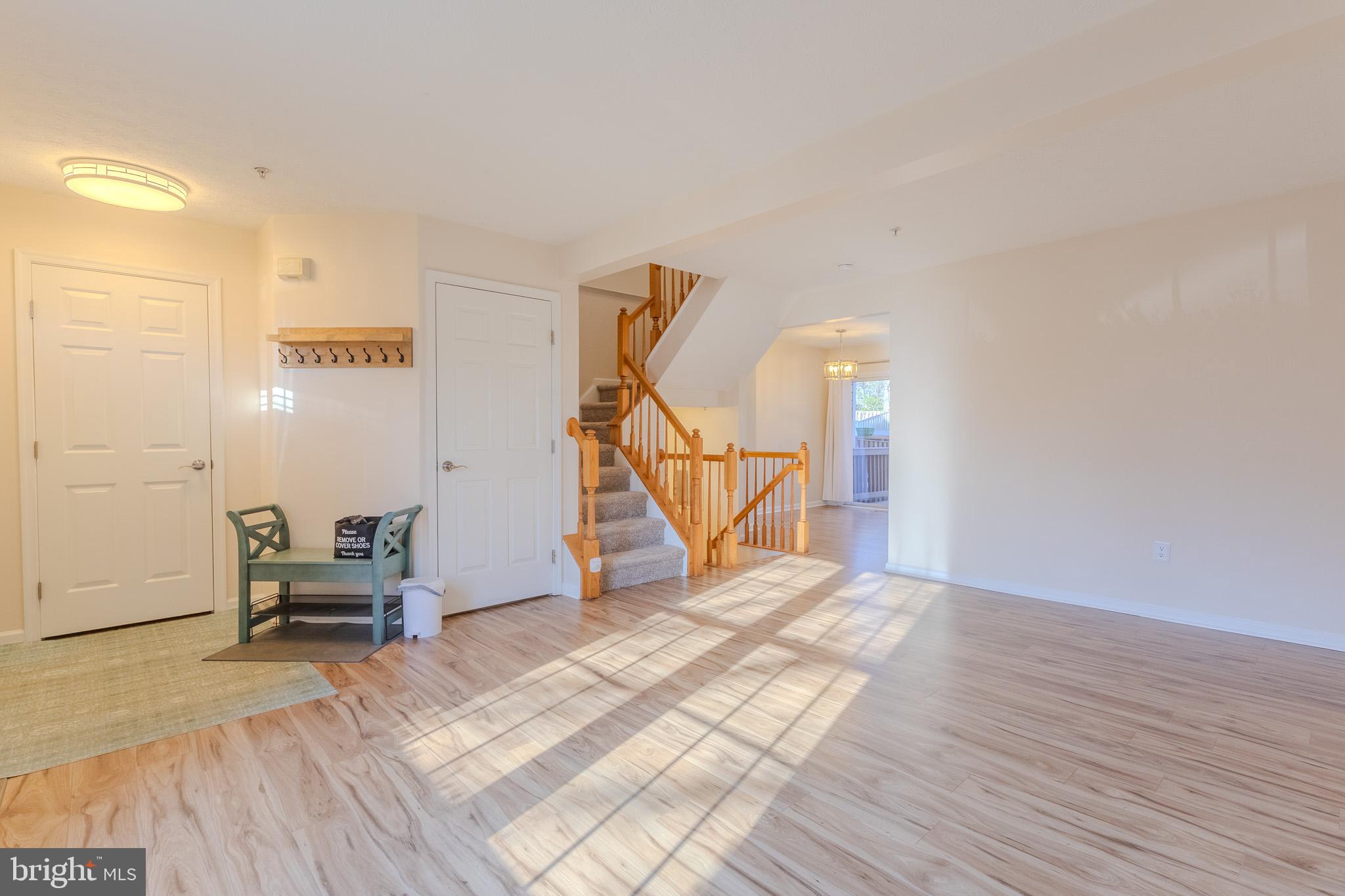 2437 High Brandy Way Odenton, MD 21113 - Photo 6 of 47 a living room with furniture and stairs