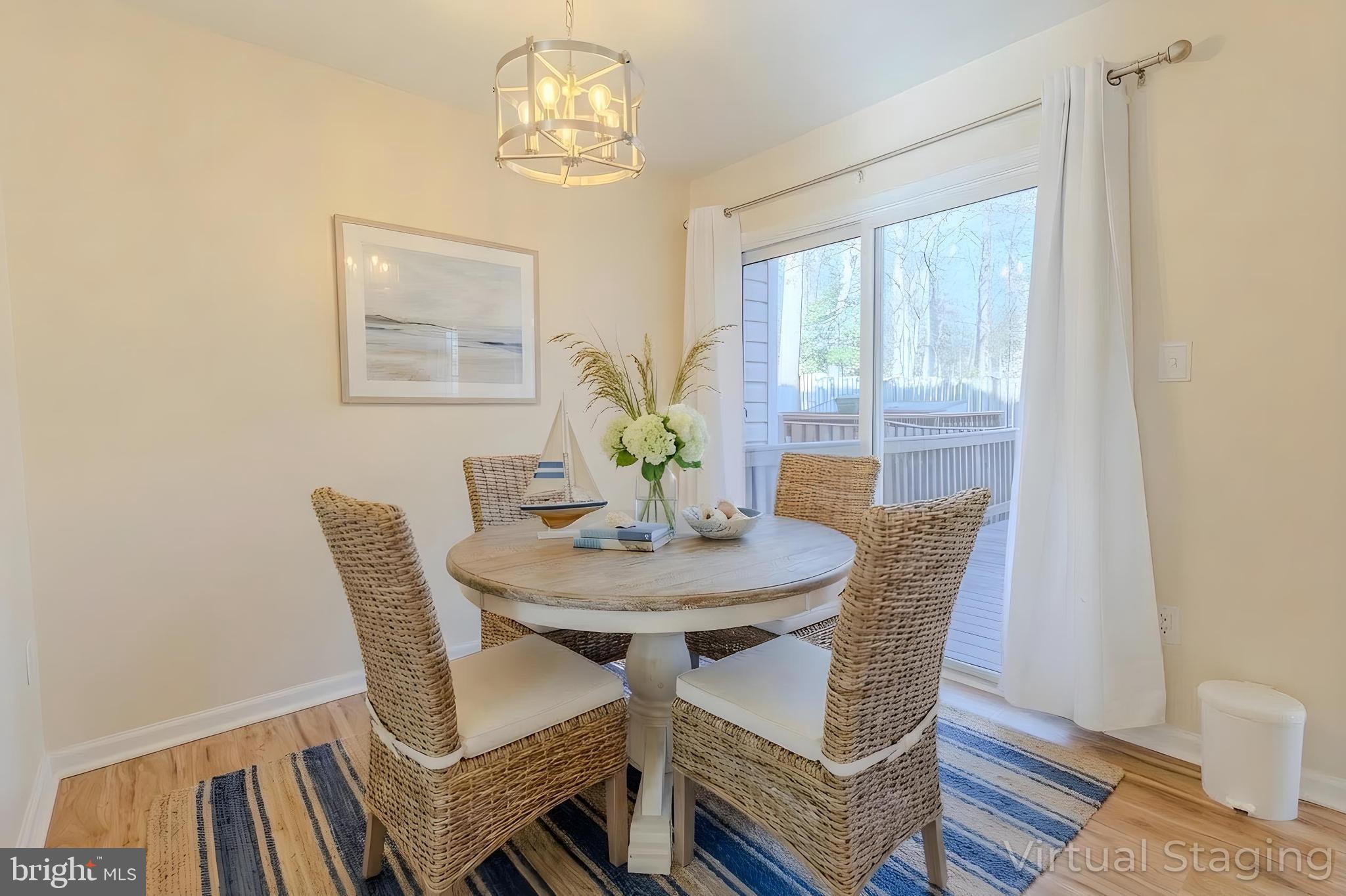 2437 High Brandy Way Odenton, MD 21113 - Photo 10 of 47 a view of a dining room with furniture and wooden floor