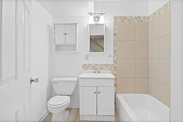 a view of a hallway with entryway