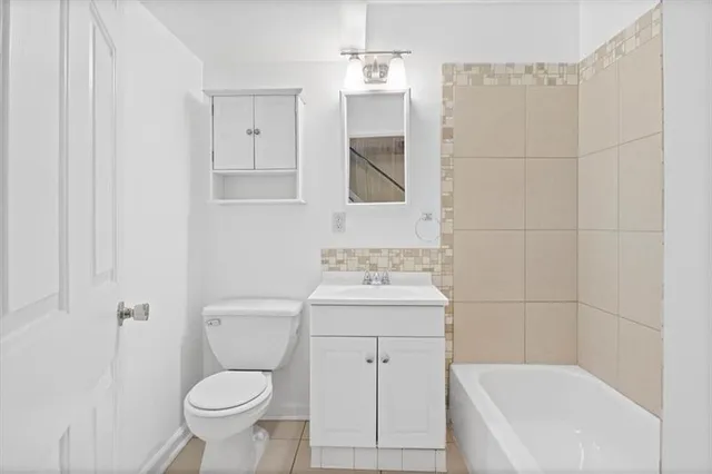 a view of a hallway with entryway