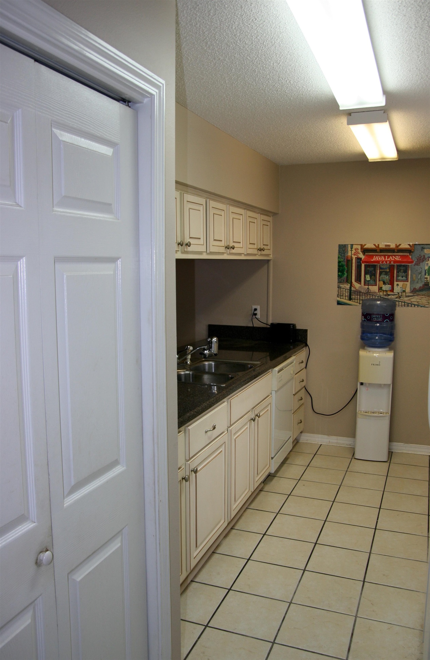9394 Villas Drive Foley, AL 36535 - Photo 9 of 33 L side pantry and Kitchen