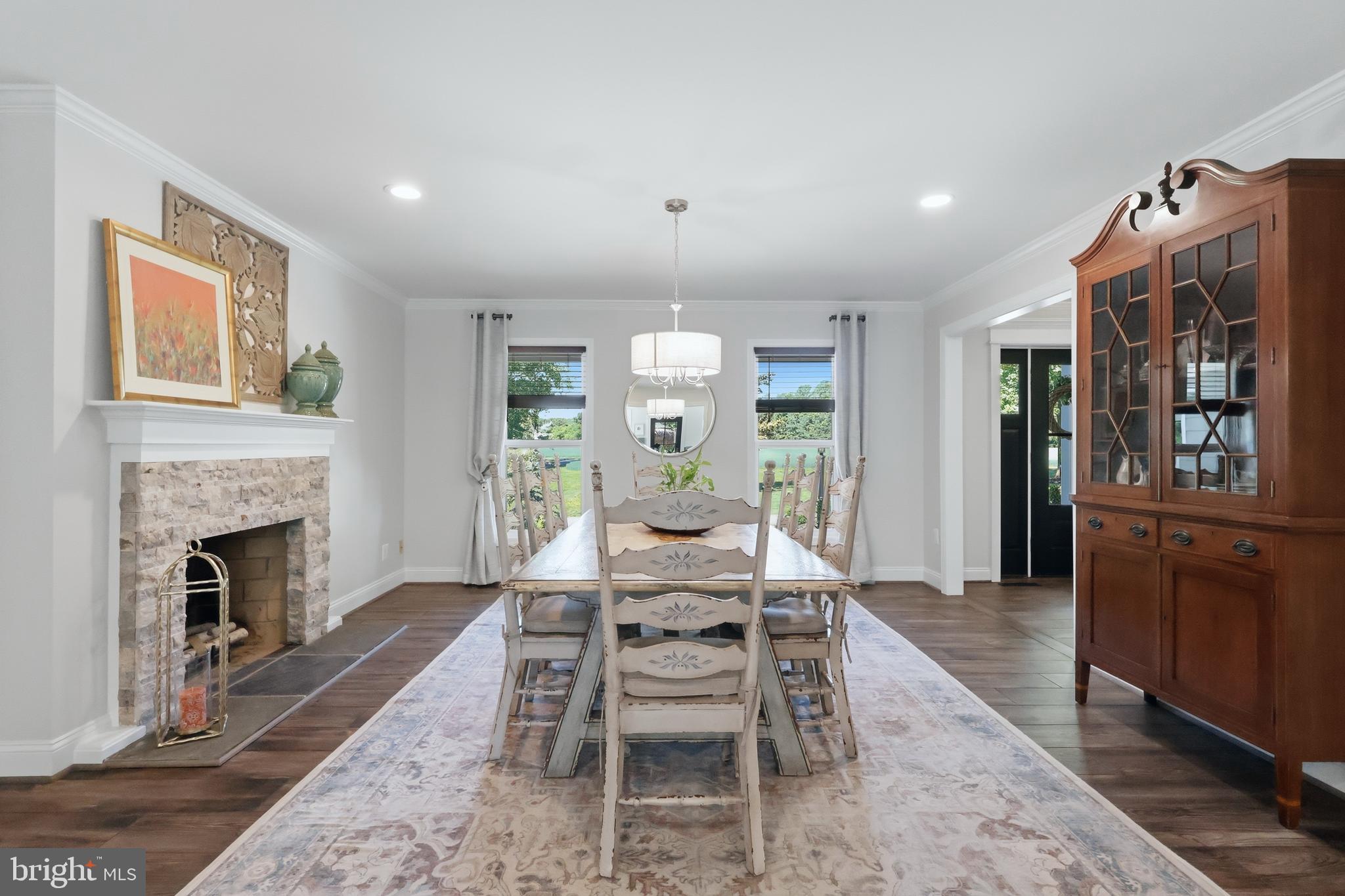 38980 Hodges Road Avenue, MD 20609 - Photo 45 of 98 Formal Dining room with stone fireplace