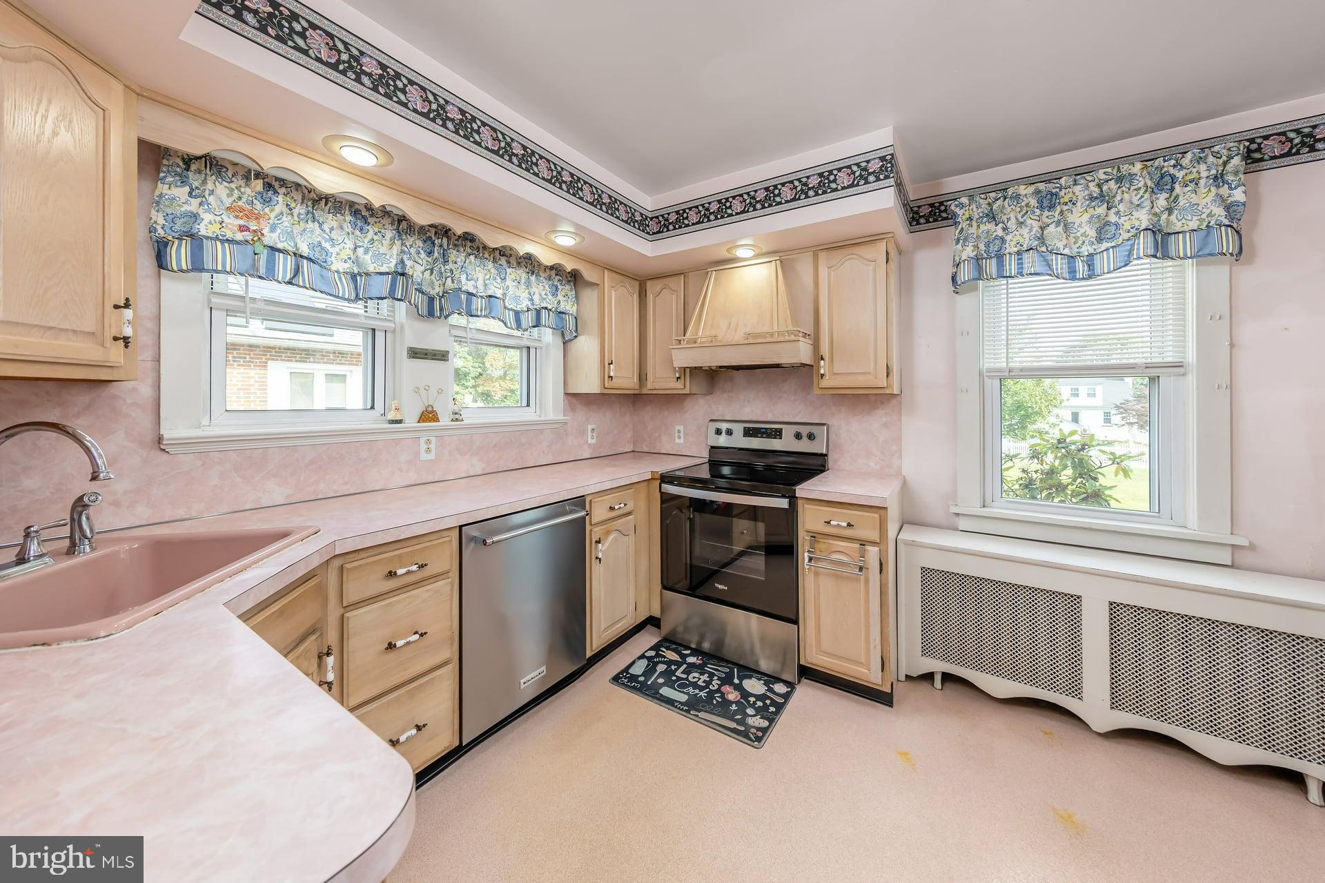 132 Tomlin Road Gibbstown, NJ 08027 - Photo 11 of 18 a kitchen with a sink stove and window