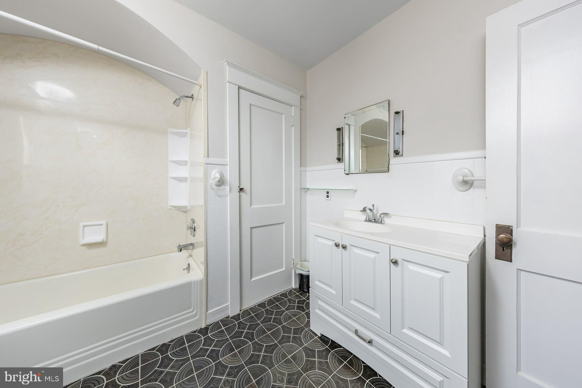 132 Tomlin Road Gibbstown, NJ 08027 - Photo 14 of 18 a bathroom with a sink a toilet and shower