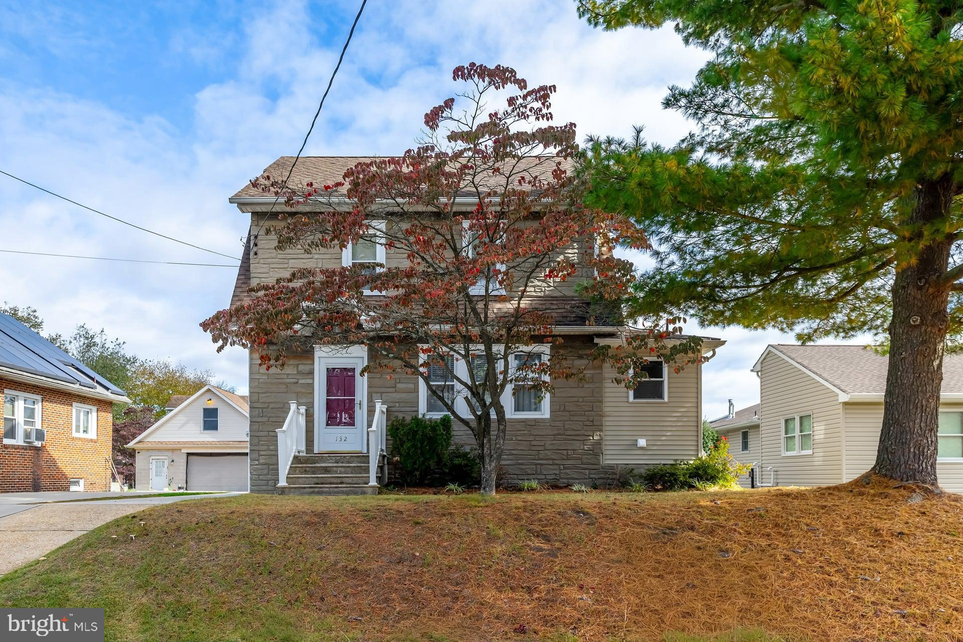 132 Tomlin Road Gibbstown, NJ 08027 - Photo 2 of 18 a front view of a house with a yard