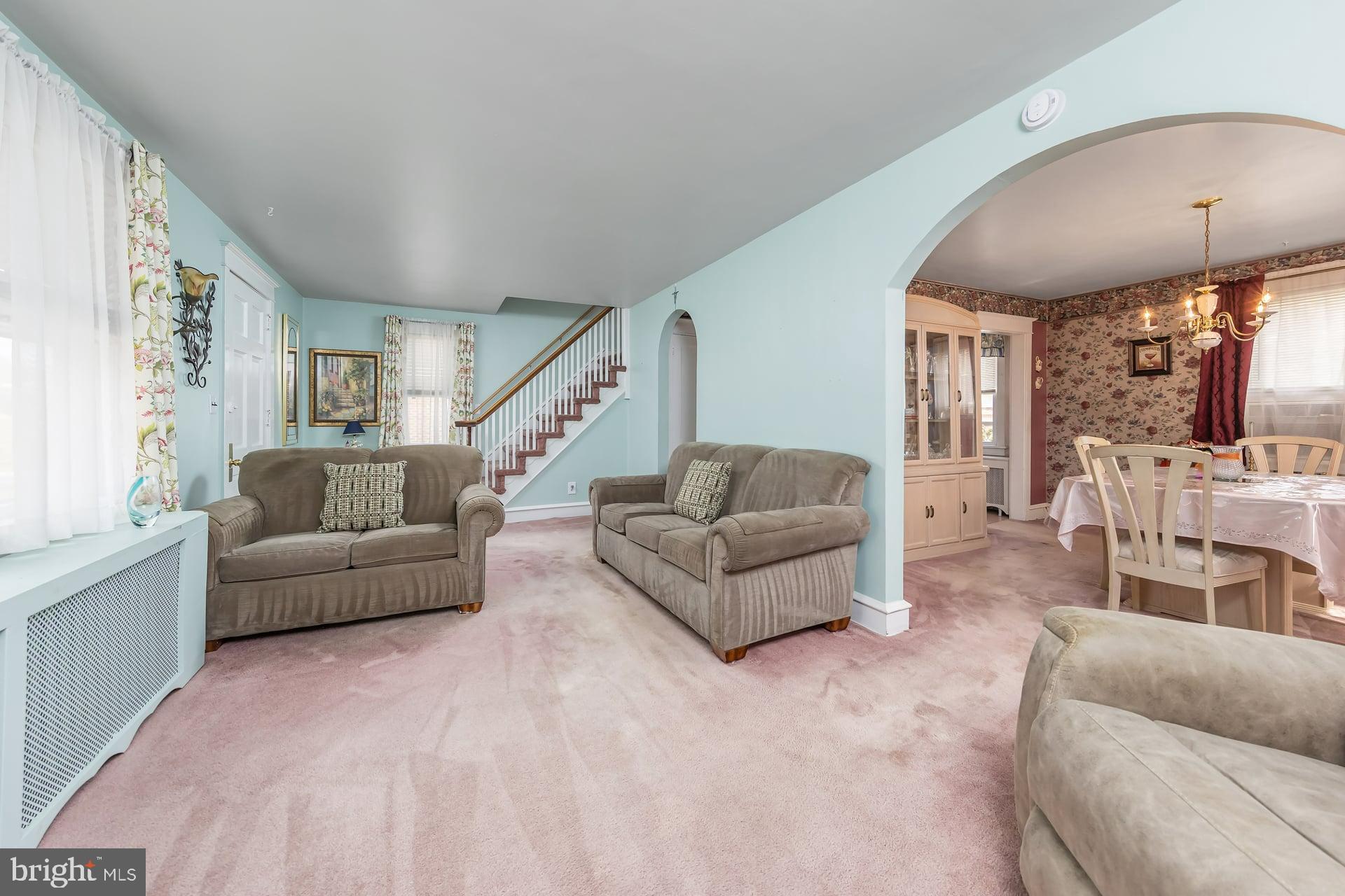 132 Tomlin Road Gibbstown, NJ 08027 - Photo 6 of 18 a living room with furniture and a large window
