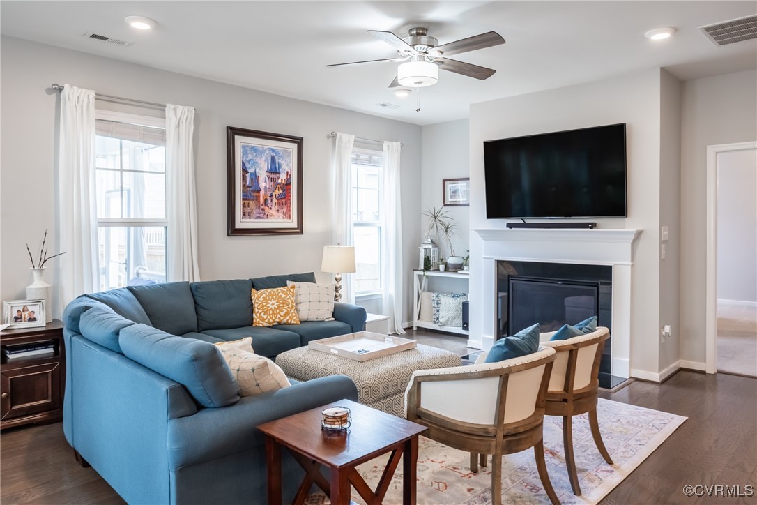 4143 Cambrian Circle Midlothian, VA 23112 - Photo 12 of 37 a living room with fireplace furniture and a flat screen tv