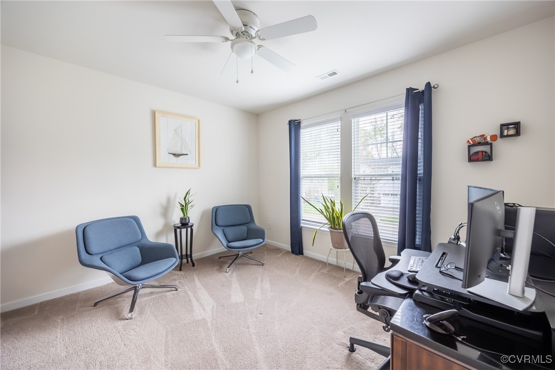 4143 Cambrian Circle Midlothian, VA 23112 - Photo 15 of 37 a view of a workspace with furniture and a window