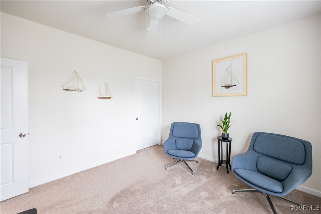 4143 Cambrian Circle Midlothian, VA 23112 - Photo 16 of 37 a living room with furniture and a potted plant