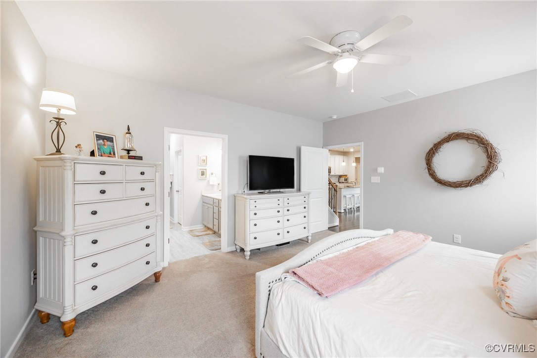 4143 Cambrian Circle Midlothian, VA 23112 - Photo 20 of 37 a bedroom with a bed a flat screen tv and a dresser