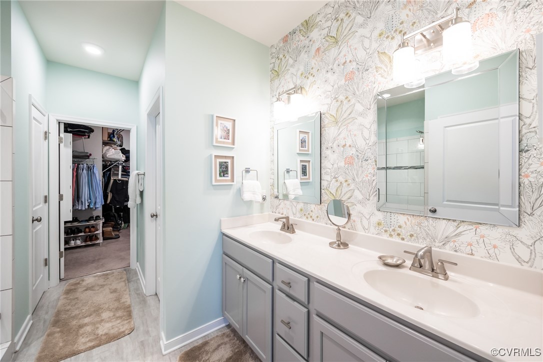 4143 Cambrian Circle Midlothian, VA 23112 - Photo 21 of 37 a bathroom with double vanity sinks and a mirror