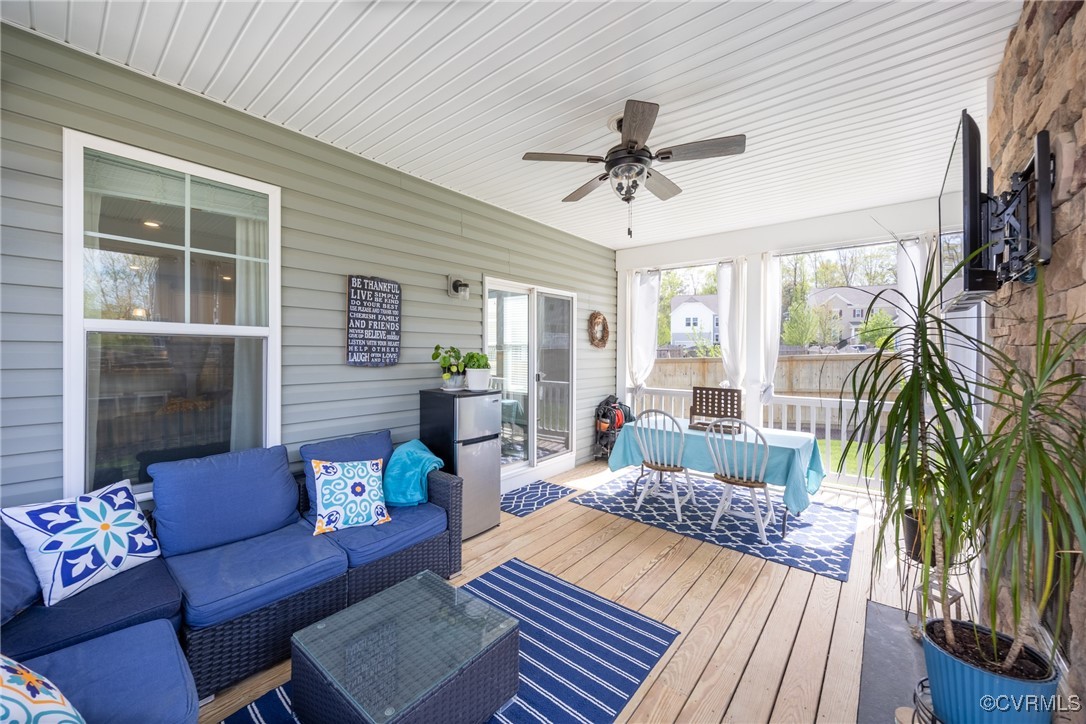 4143 Cambrian Circle Midlothian, VA 23112 - Photo 34 of 37 a living room with furniture and a large window