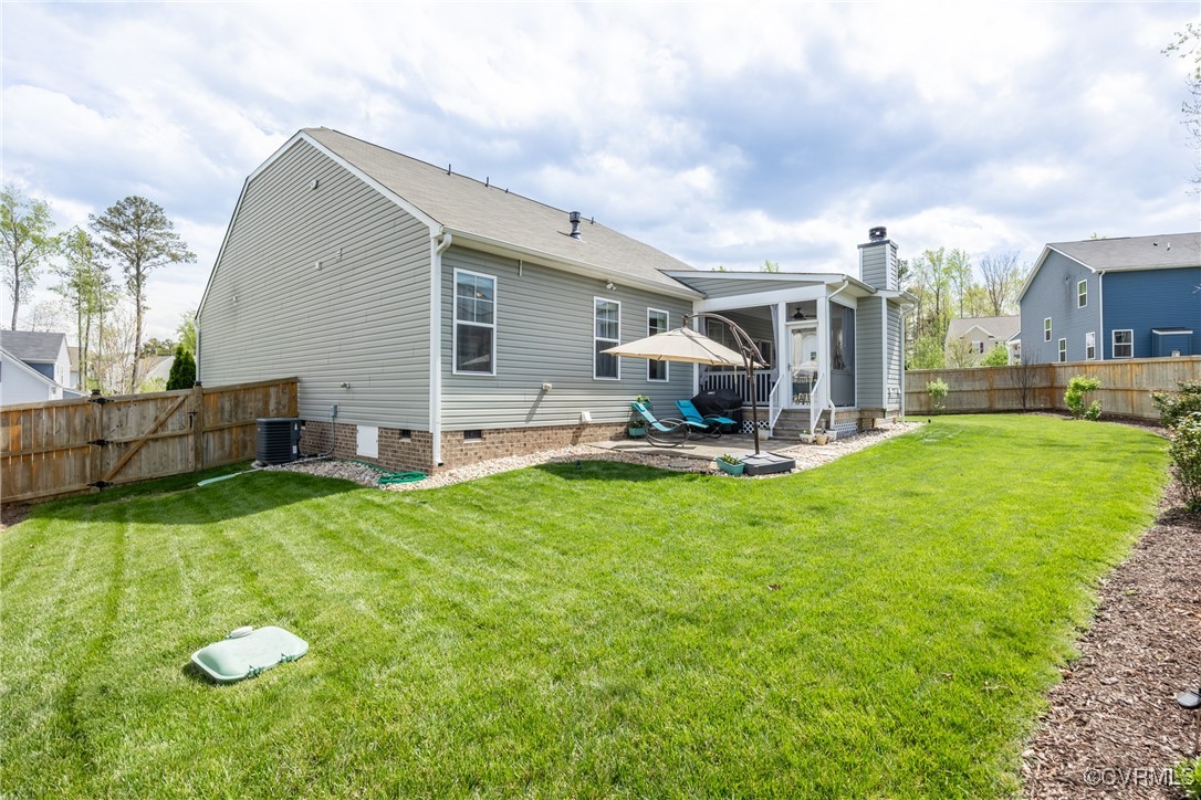 4143 Cambrian Circle Midlothian, VA 23112 - Photo 37 of 37 a view of backyard of house with wooden deck and furniture