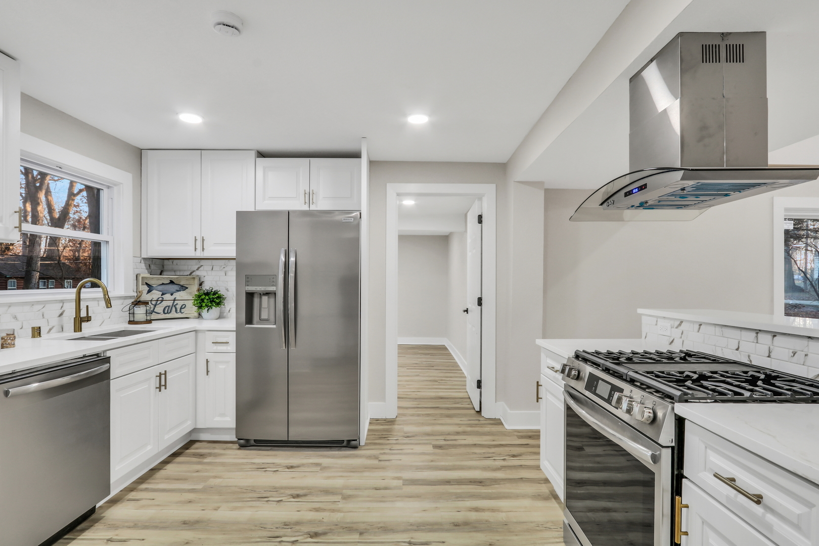 38323 North 3rd Avenue Spring Grove, IL 60081 - Photo 12 of 27 a kitchen with stainless steel appliances granite countertop a stove a refrigerator and a refrigerator