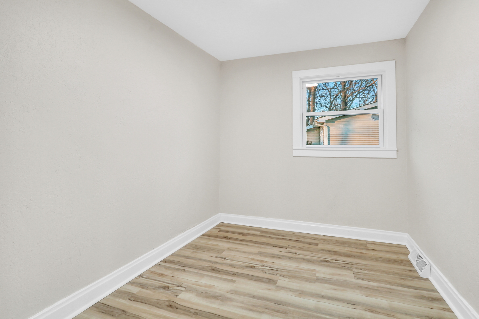 38323 North 3rd Avenue Spring Grove, IL 60081 - Photo 15 of 27 a view of empty room with wooden floor