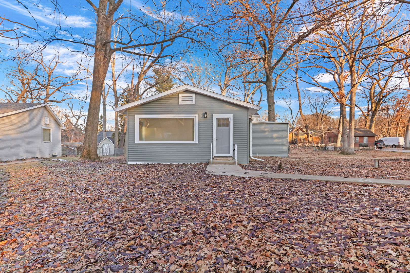 38323 North 3rd Avenue Spring Grove, IL 60081 - Photo 20 of 27 a front view of a house with a yard and garage
