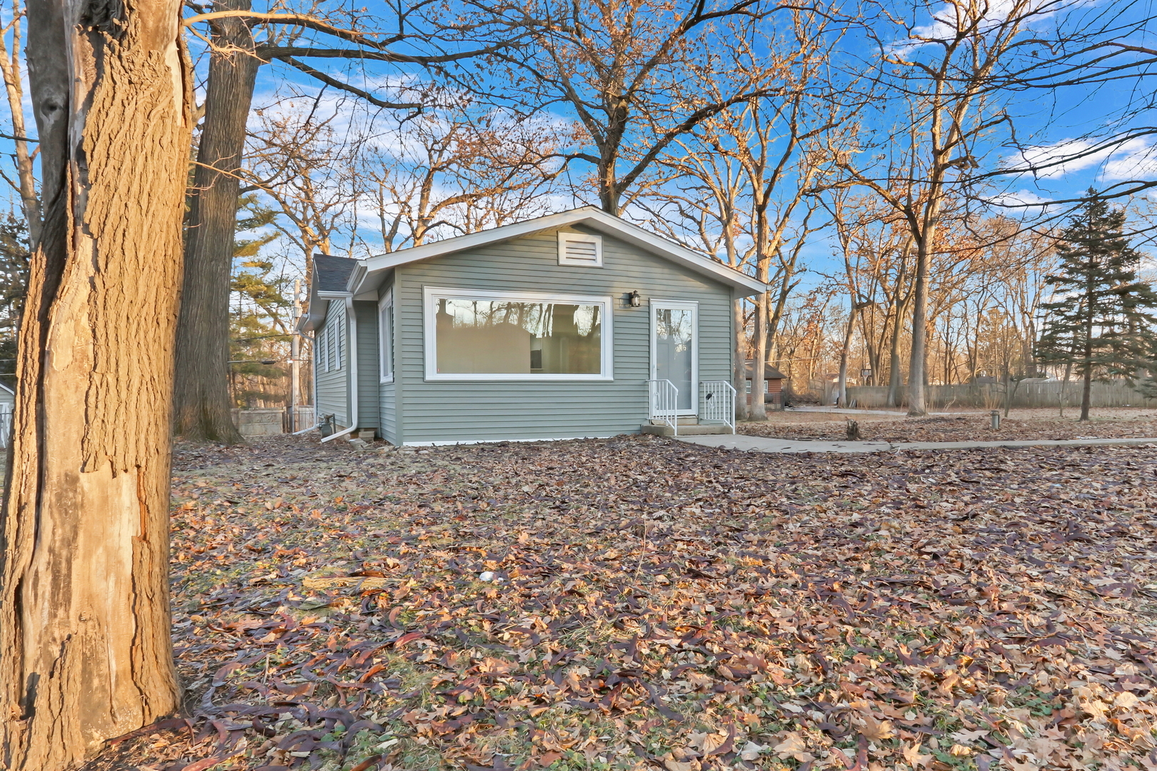 38323 North 3rd Avenue Spring Grove, IL 60081 - Photo 21 of 27 a front view of a house with a yard