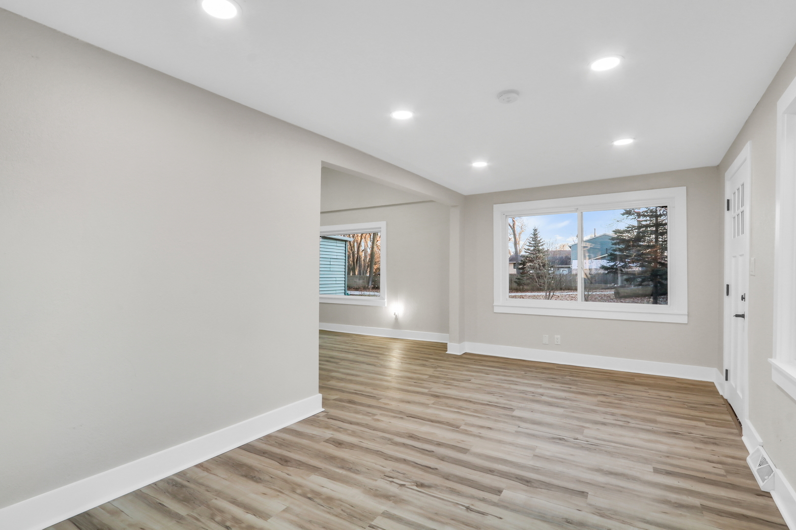 38323 North 3rd Avenue Spring Grove, IL 60081 - Photo 4 of 27 a view of empty room with wooden floor and fan