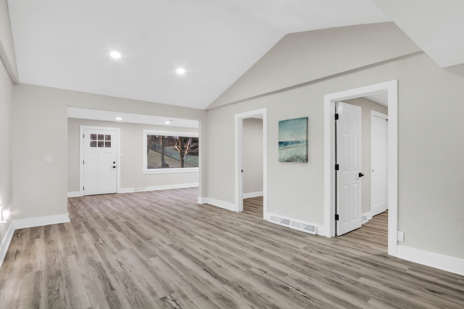 38323 North 3rd Avenue Spring Grove, IL 60081 - Photo 8 of 27 a view of an empty room with wooden floor and a window
