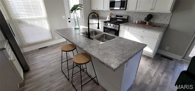 $289,700 | 3072 Wintergreen Drive, Florissant, MO 63033