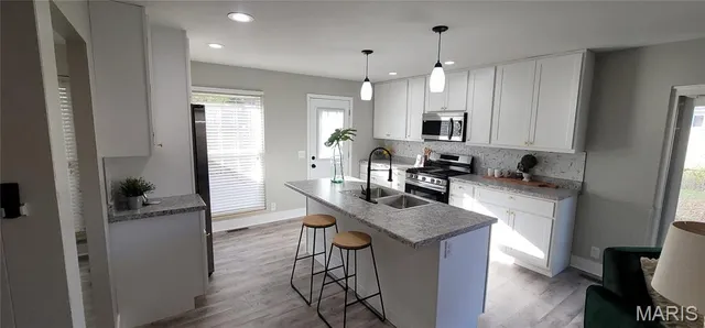 $289,700 | 3072 Wintergreen Drive, Florissant, MO 63033