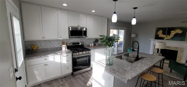 $289,700 | 3072 Wintergreen Drive, Florissant, MO 63033