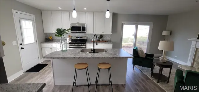 $289,700 | 3072 Wintergreen Drive, Florissant, MO 63033