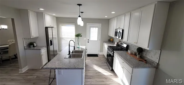 $289,700 | 3072 Wintergreen Drive, Florissant, MO 63033