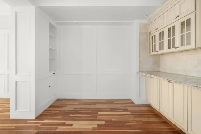 a view of a livingroom with wooden floor