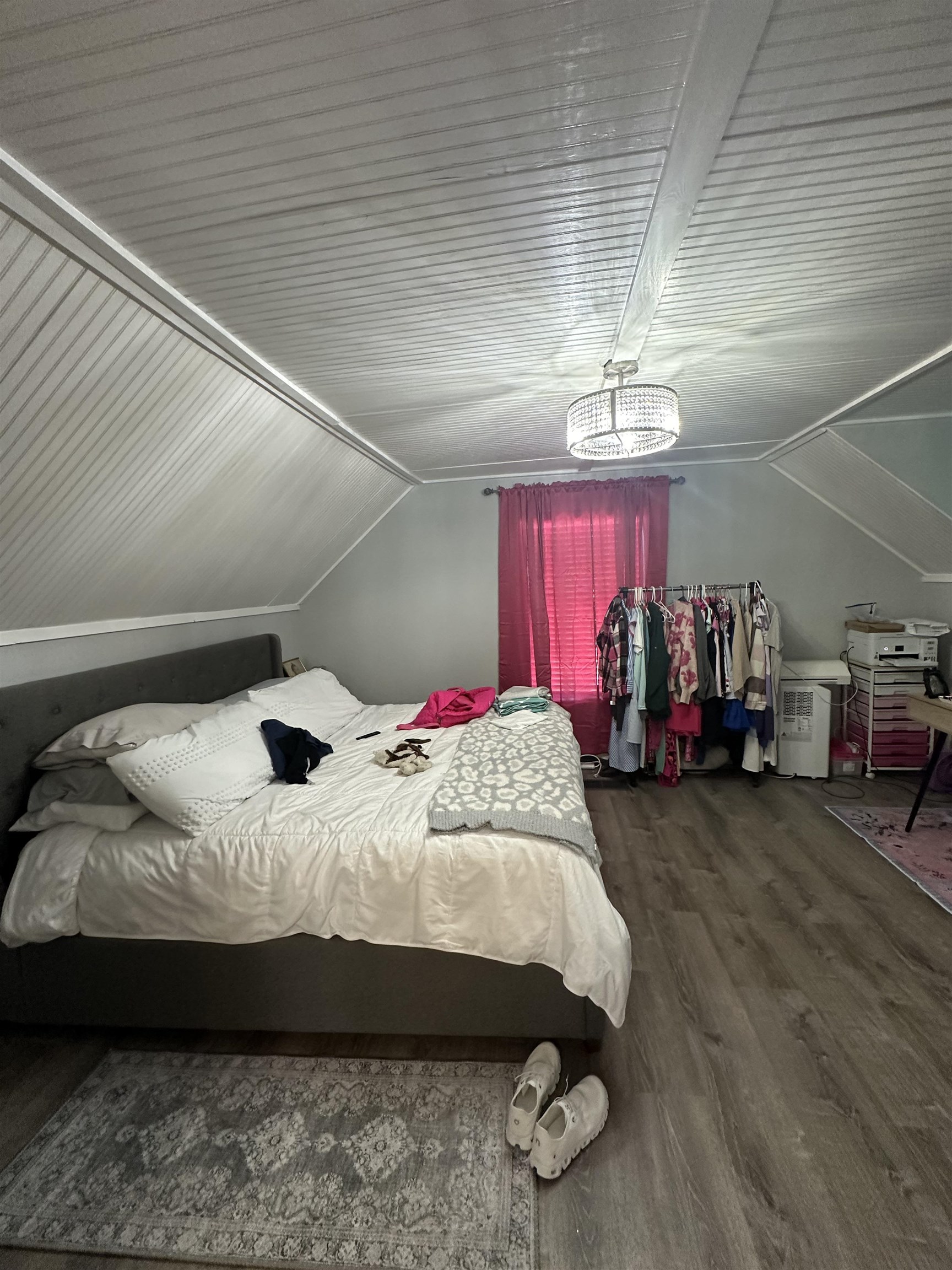 6659 Brevard Street St. Augustine, FL 32080 - Photo 27 of 27 a bed sitting in a room next to a window