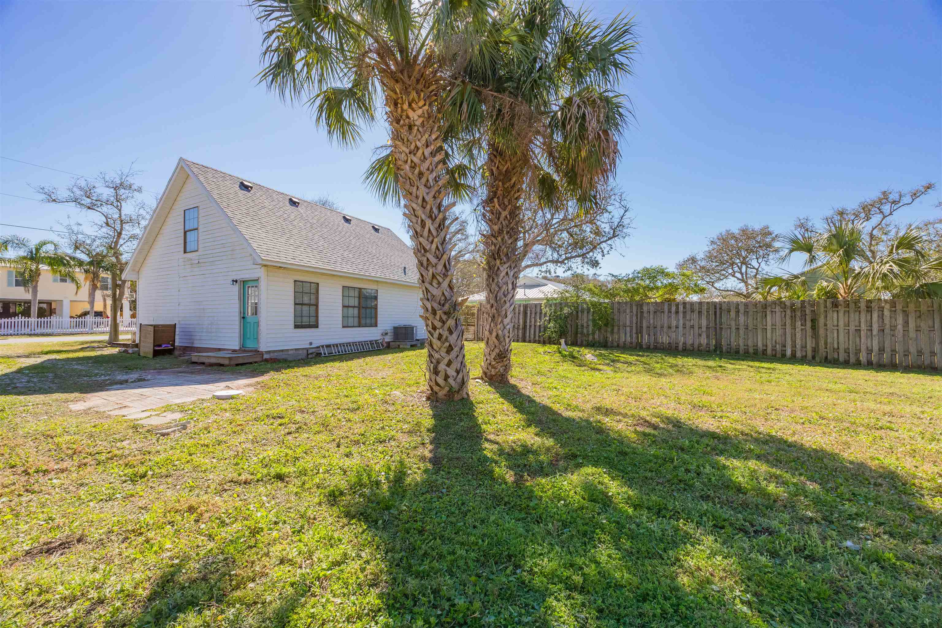 6659 Brevard Street St. Augustine, FL 32080 - Photo 3 of 27 a swimming pool with yard in front of it