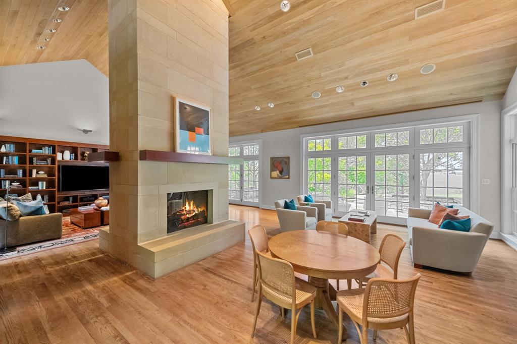 8055 Eagle Mountain Circle Fort Worth, TX 76135 - Photo 14 of 40 a view of a dining room with furniture window and wooden floor