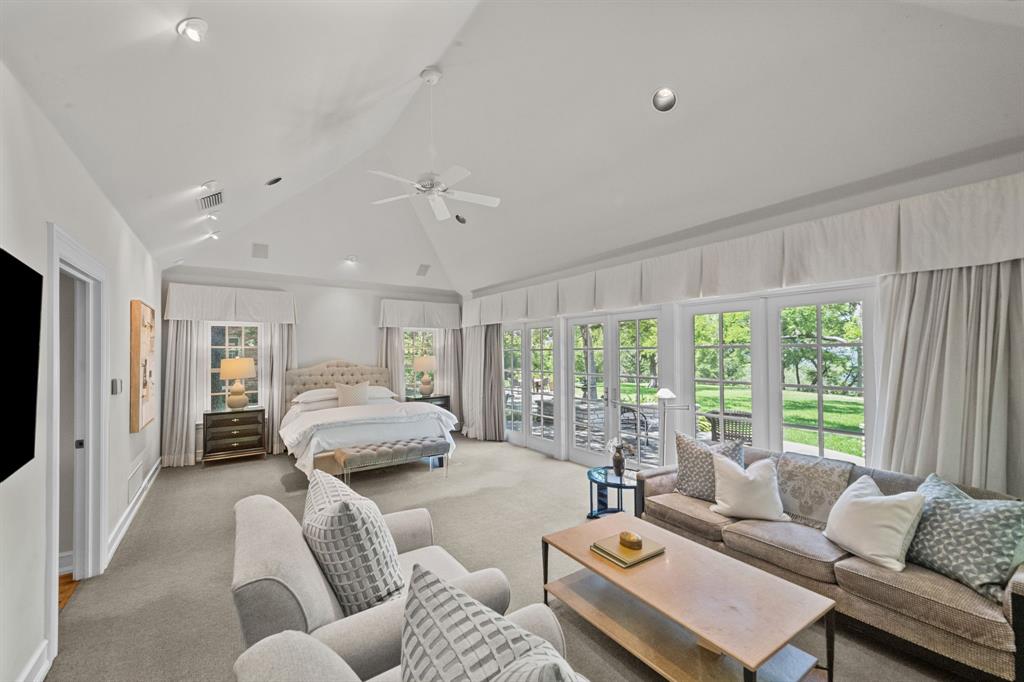 8055 Eagle Mountain Circle Fort Worth, TX 76135 - Photo 20 of 40 a living room with furniture and a large window