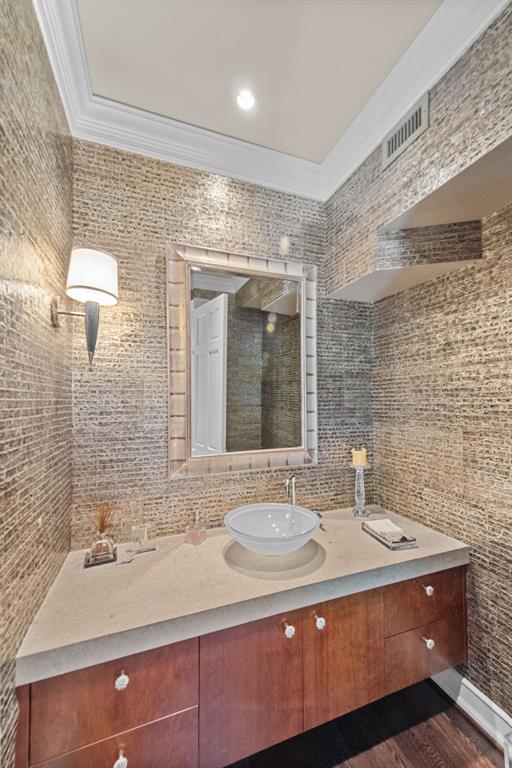 8055 Eagle Mountain Circle Fort Worth, TX 76135 - Photo 23 of 40 a bathroom with a sink and a mirror