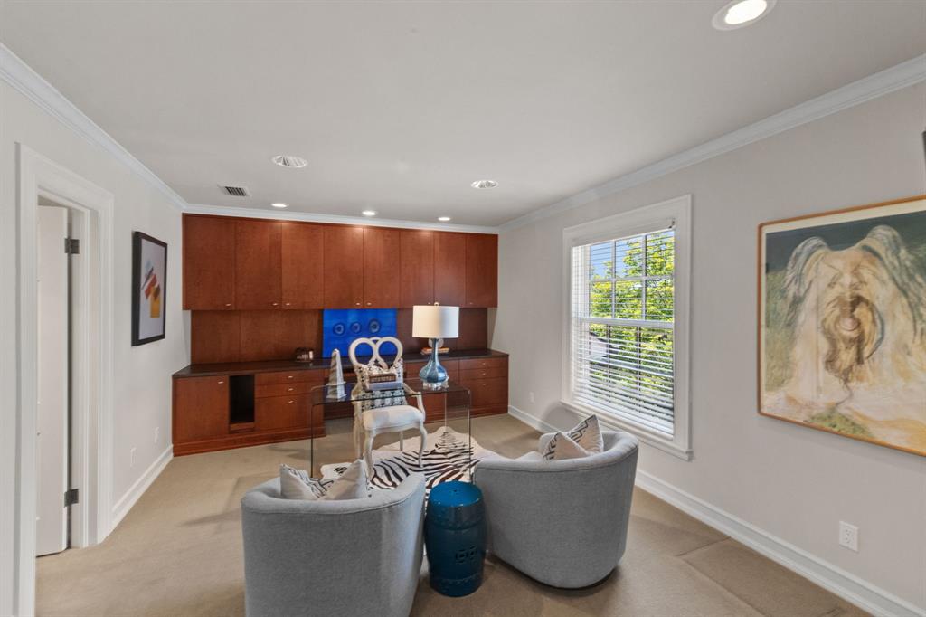 8055 Eagle Mountain Circle Fort Worth, TX 76135 - Photo 25 of 40 a living room with a couch and a table