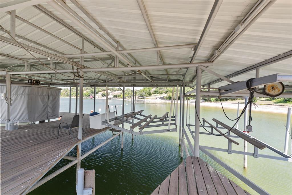 8055 Eagle Mountain Circle Fort Worth, TX 76135 - Photo 39 of 40 a view of a balcony with chairs