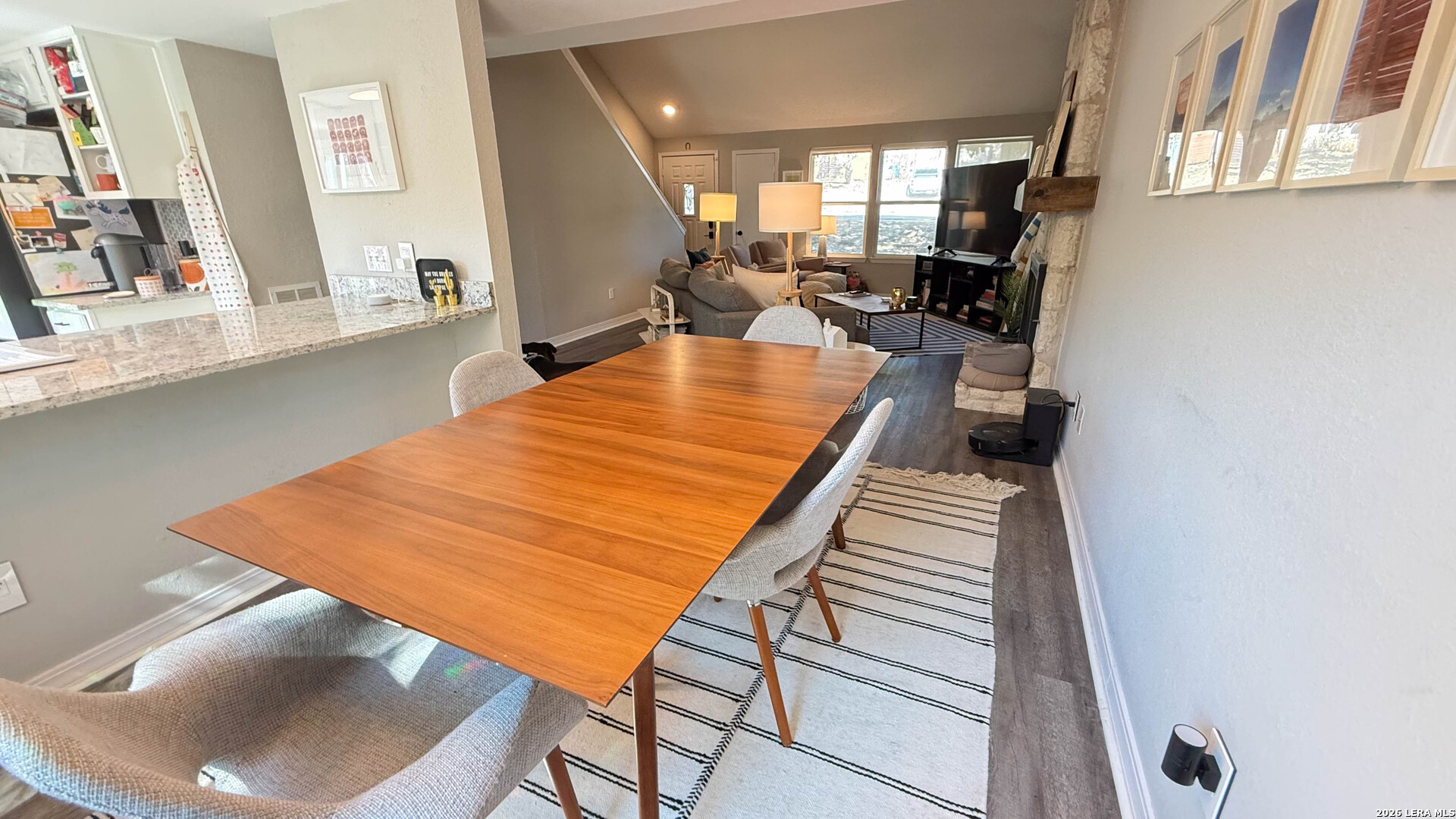 8505 Spring Valley Drive Austin, TX 78736 - Photo 12 of 49 a room with wooden floor and furniture