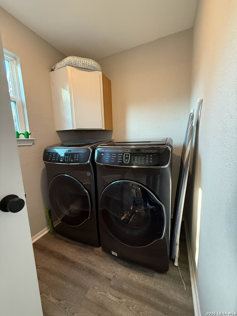 8505 Spring Valley Drive Austin, TX 78736 - Photo 22 of 49 a utility room with dryer and washer