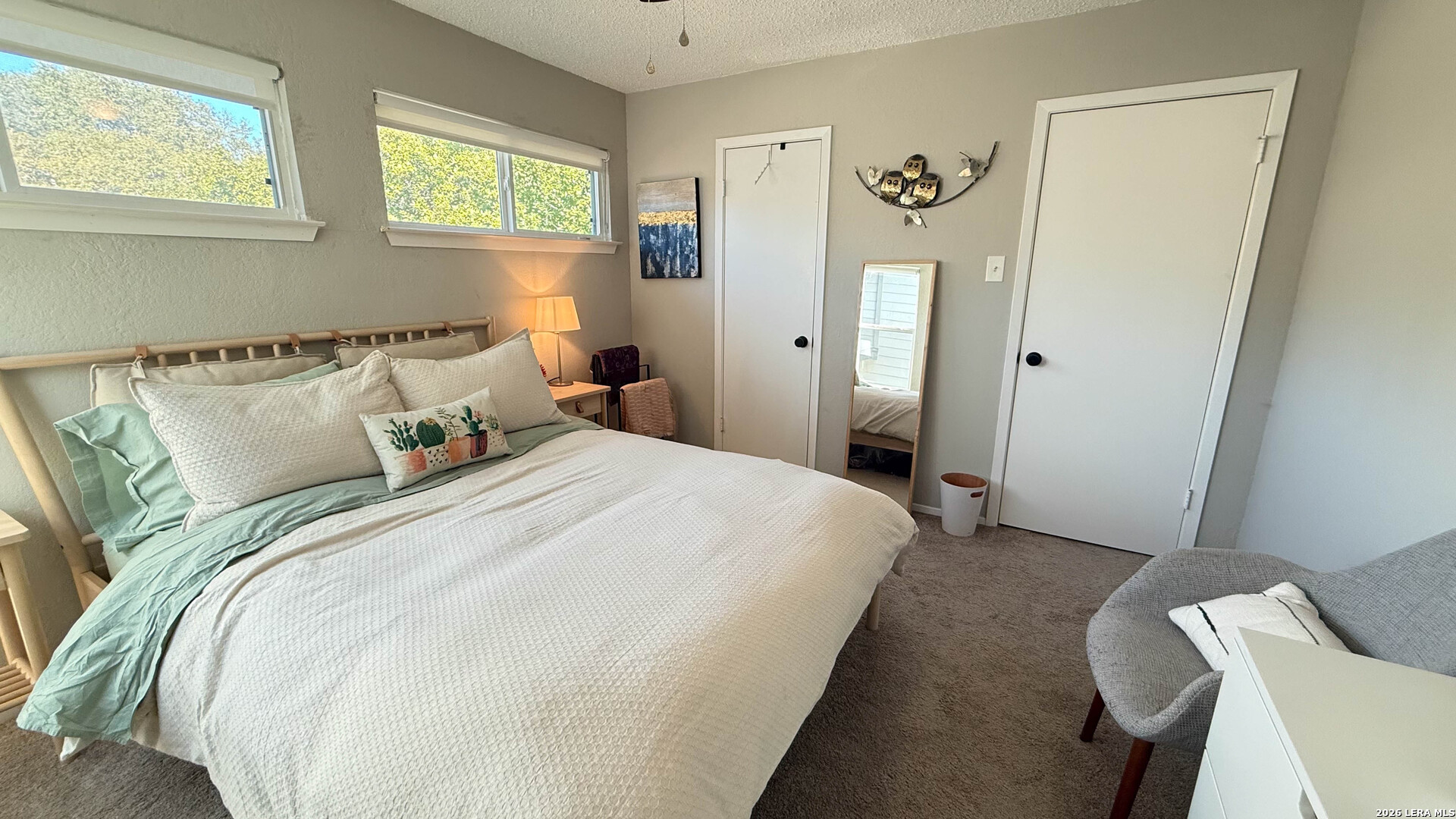 8505 Spring Valley Drive Austin, TX 78736 - Photo 25 of 49 a bedroom with a bed and a window