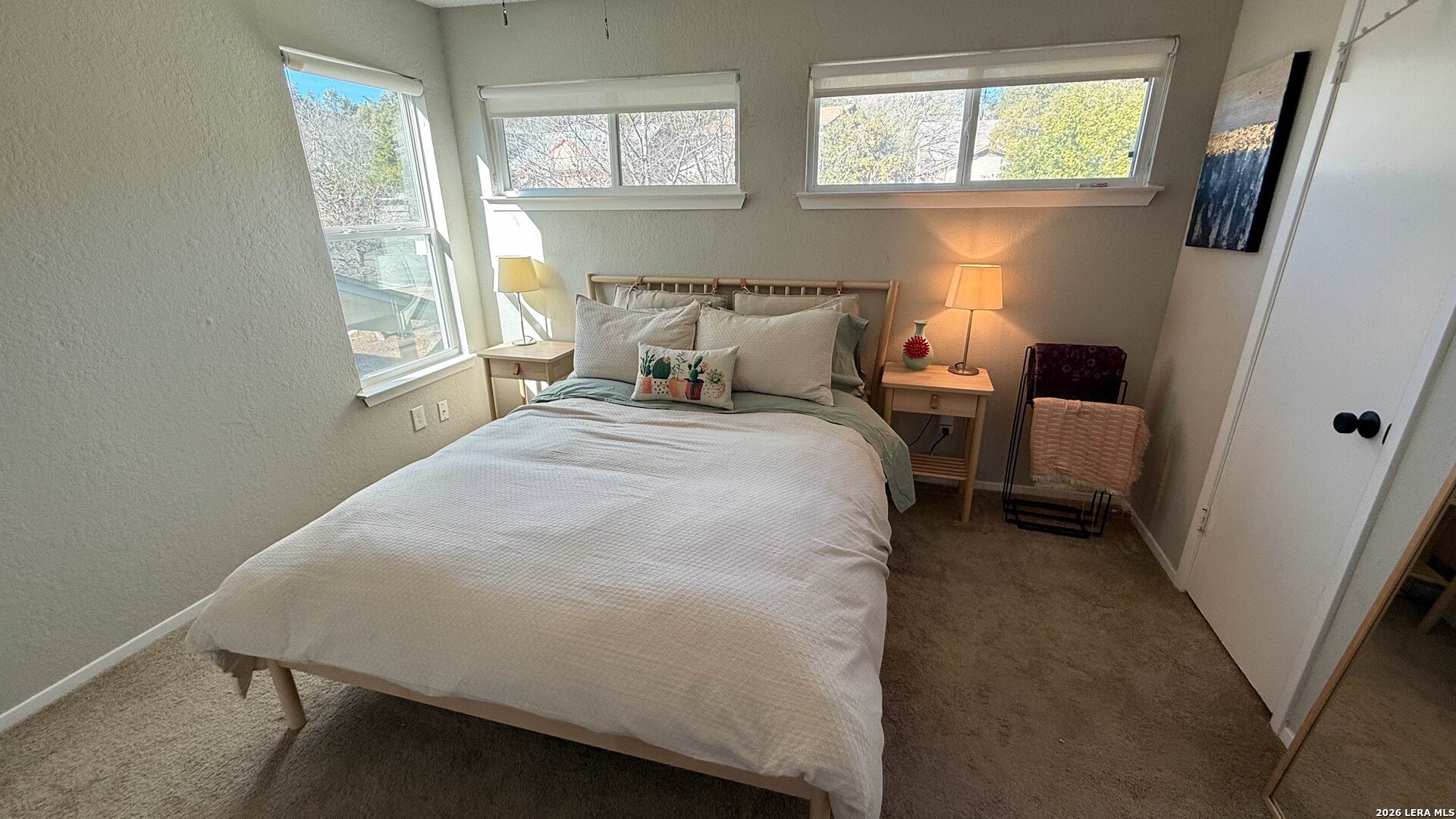 8505 Spring Valley Drive Austin, TX 78736 - Photo 27 of 49 a bedroom with a bed and a window