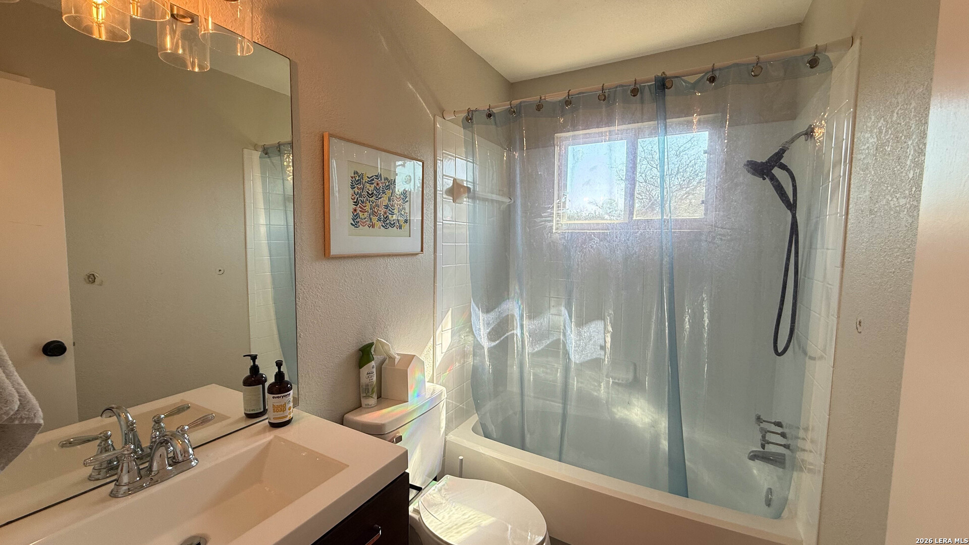 8505 Spring Valley Drive Austin, TX 78736 - Photo 31 of 49 a bathroom with a granite countertop sink toilet and shower