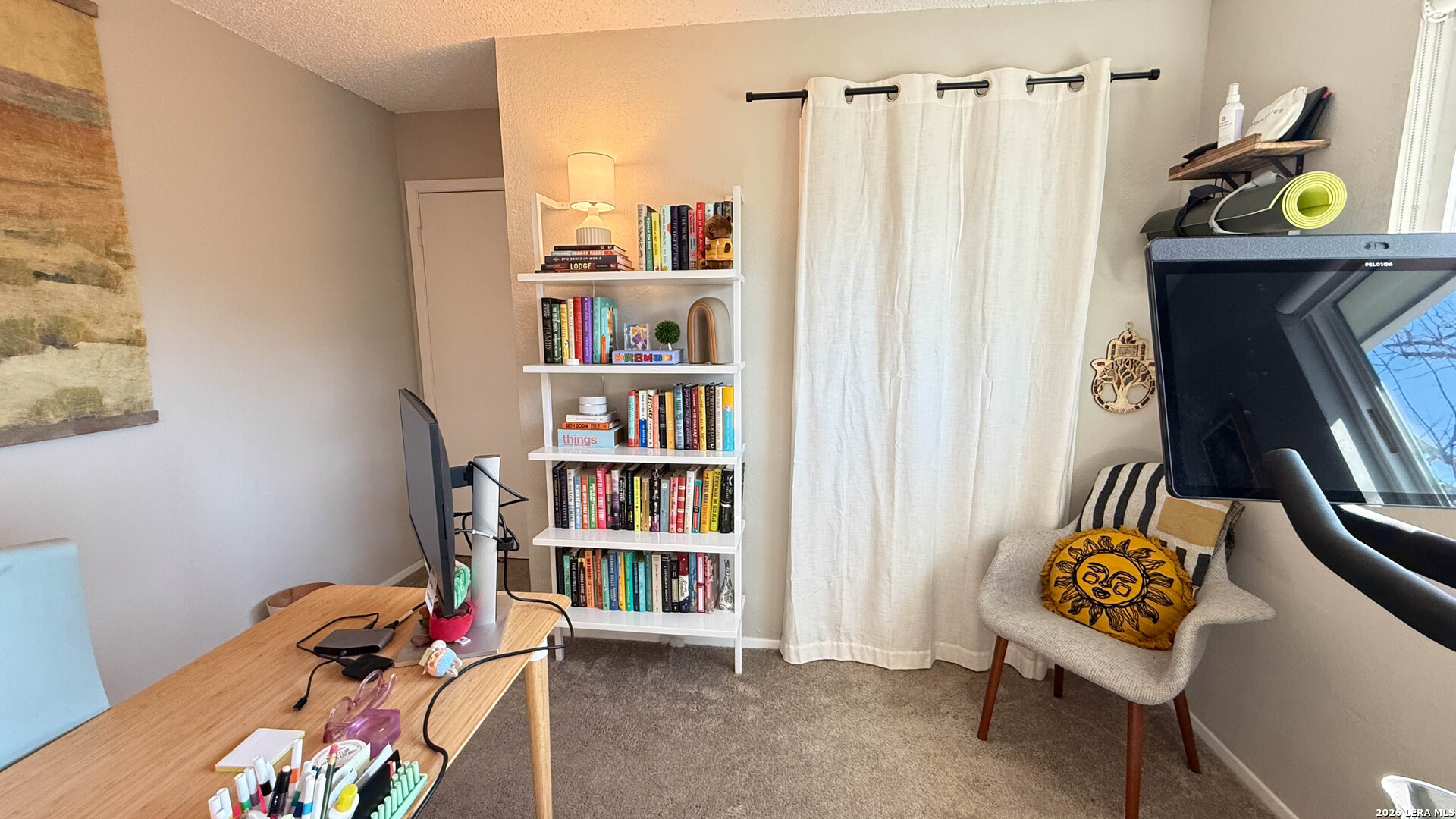 8505 Spring Valley Drive Austin, TX 78736 - Photo 33 of 49 a view of a workspace with furniture and toys