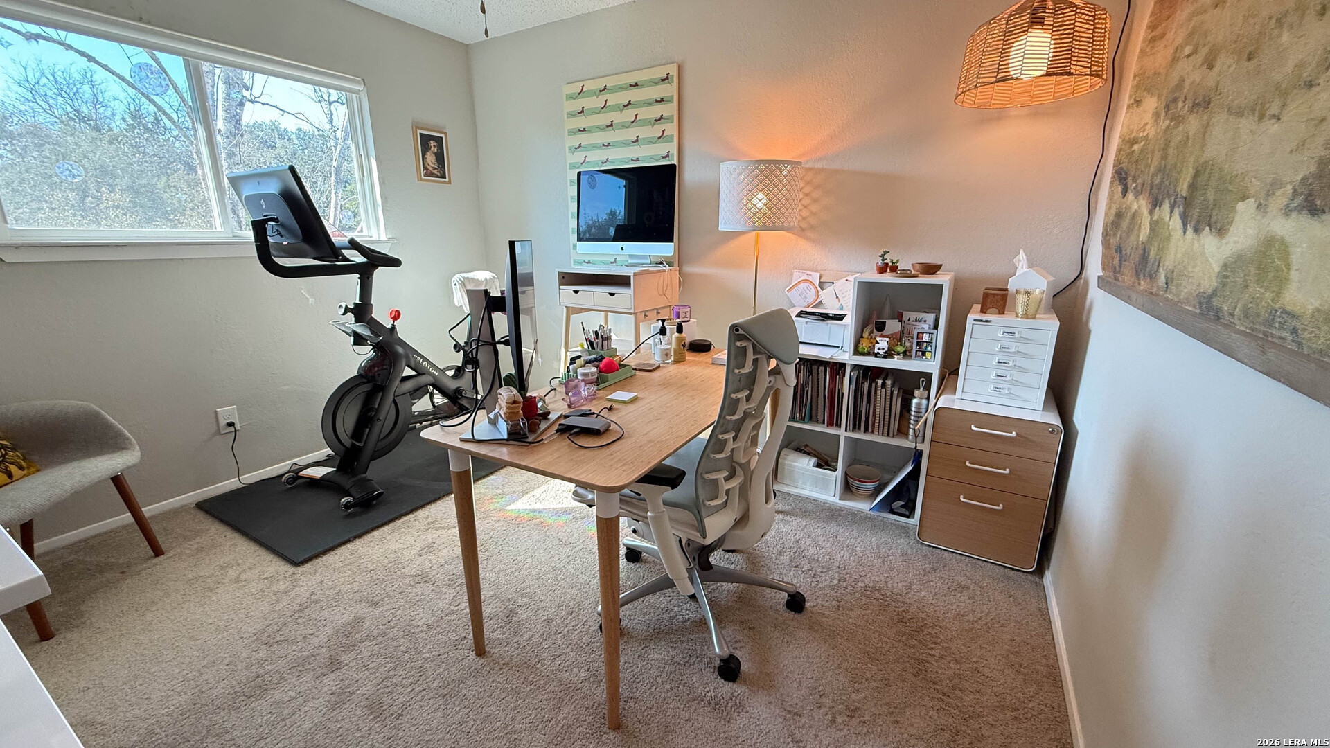 8505 Spring Valley Drive Austin, TX 78736 - Photo 36 of 49 a view of a workspace with furniture and a window