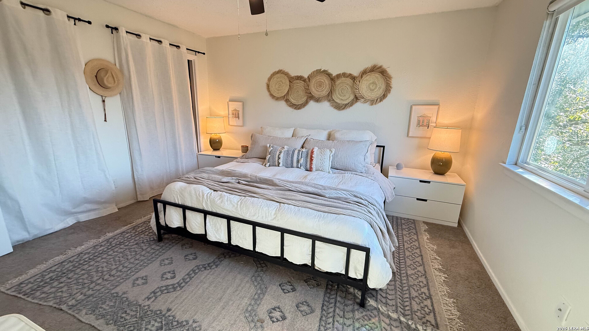 8505 Spring Valley Drive Austin, TX 78736 - Photo 41 of 49 a bedroom with a bed and a window