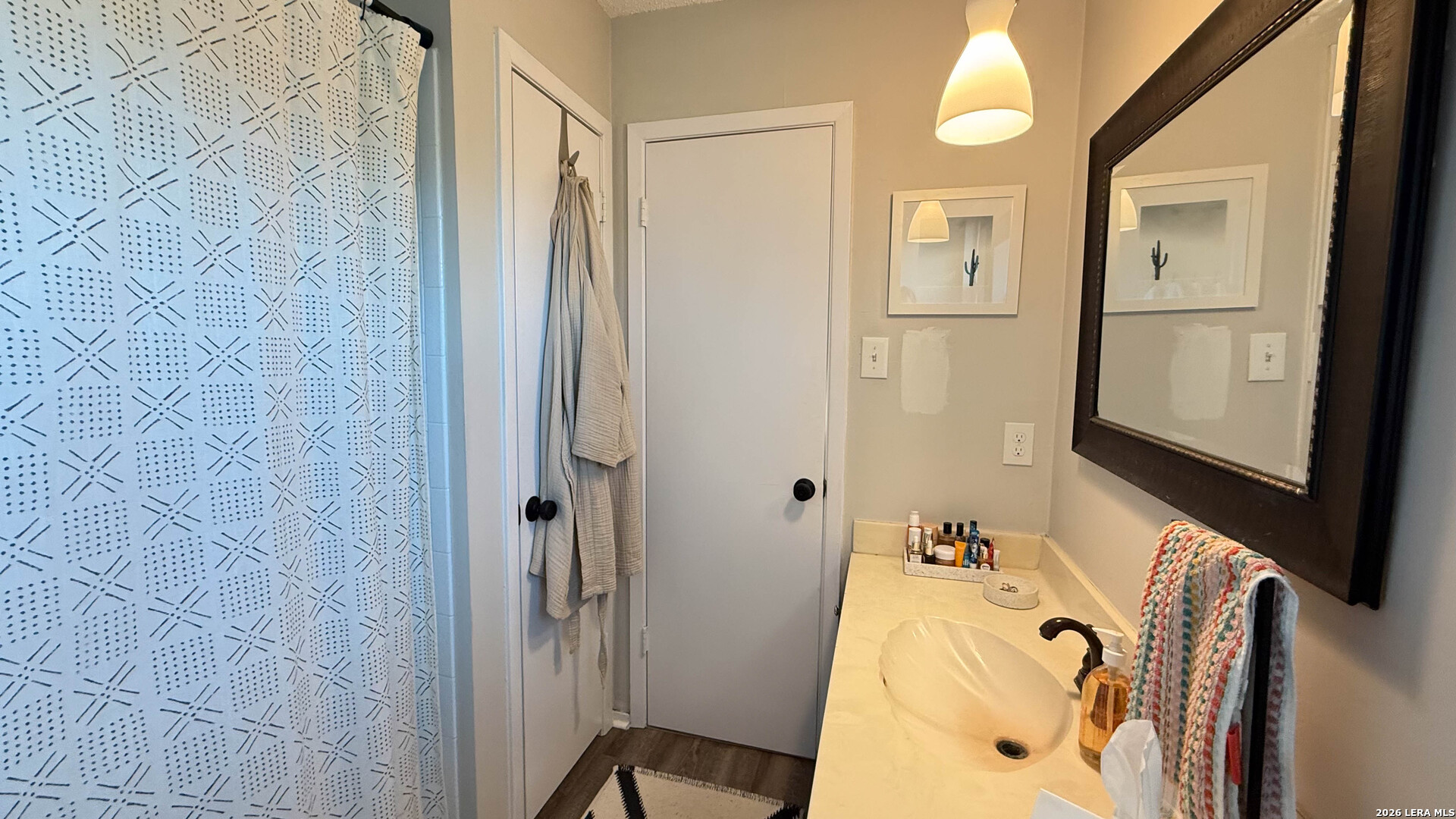 8505 Spring Valley Drive Austin, TX 78736 - Photo 46 of 49 a bathroom with a tub and shower
