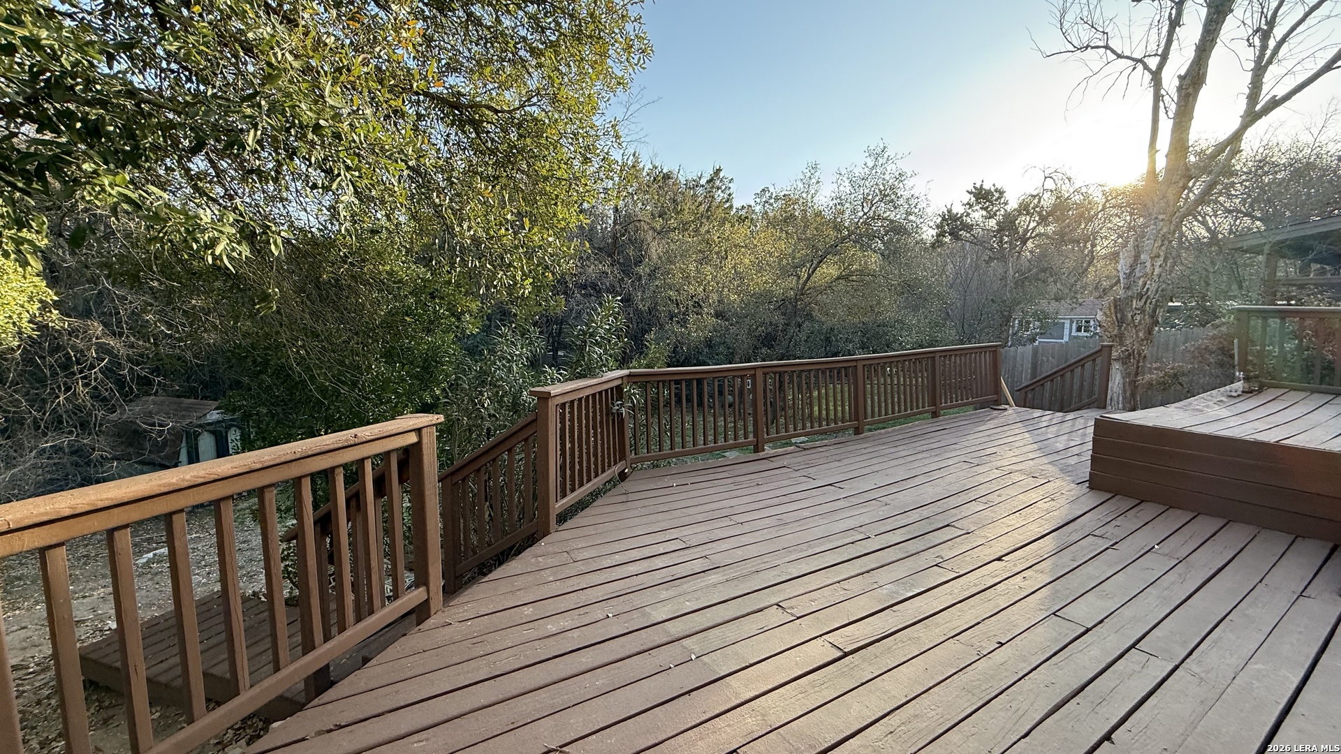 8505 Spring Valley Drive Austin, TX 78736 - Photo 48 of 49 a view of balcony with wooden floor and fence