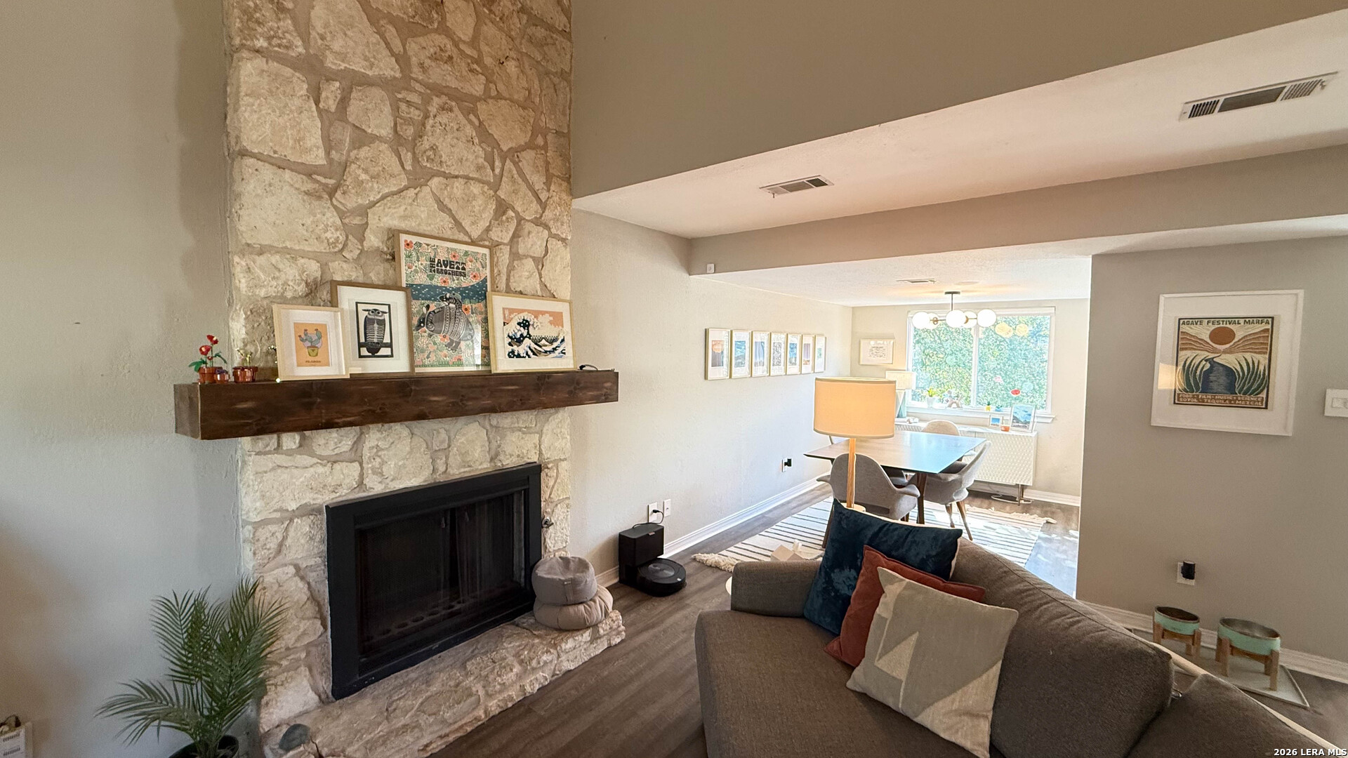 8505 Spring Valley Drive Austin, TX 78736 - Photo 7 of 49 a living room with furniture and a fireplace