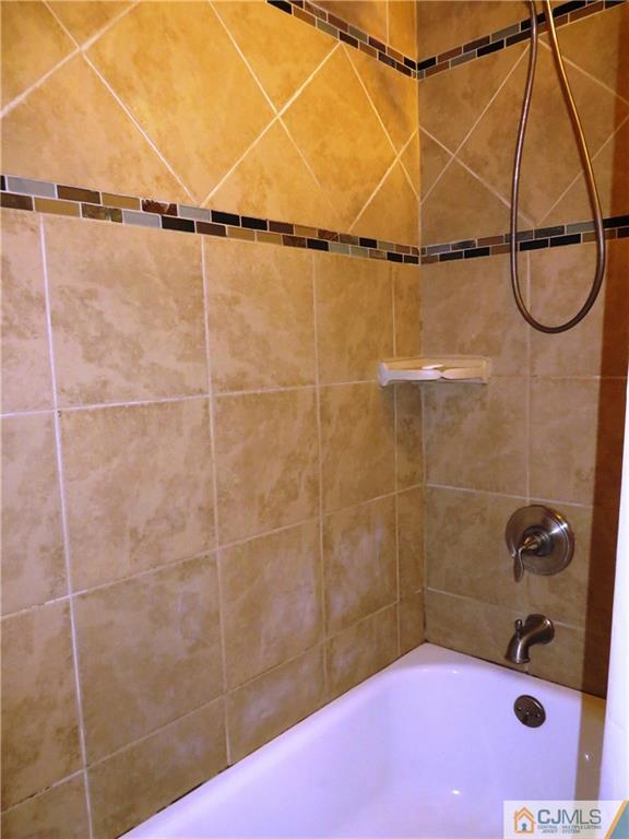213 Princeton Road Old Bridge, NJ 08859 - Photo 15 of 17 a bathroom with a sink and a shower
